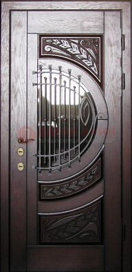 Одностворчатая входная дверь со стеклом и ковкой ДСК-21 в Бронницах