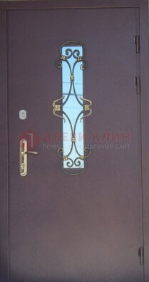 Металлическая дверь со стеклом и ковкой ДСК-77 в Бронницах